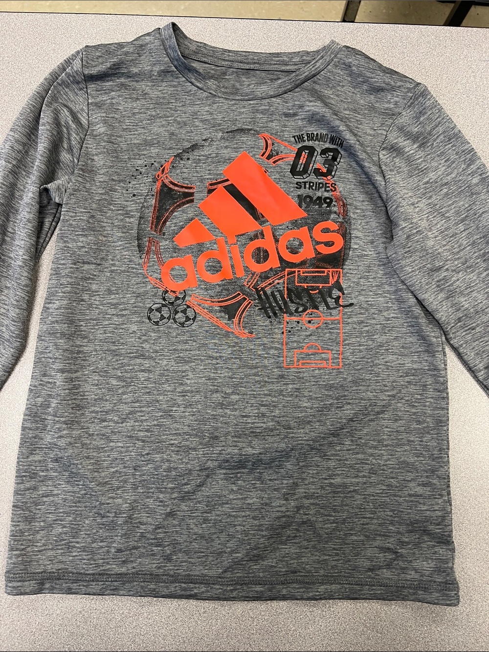 adidas Gray Long-Sleeve Top with Bright Orange Logo